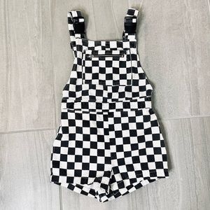 Checkered overalls- black and white. Buckled. Size L-Xl kids or 00 in adult